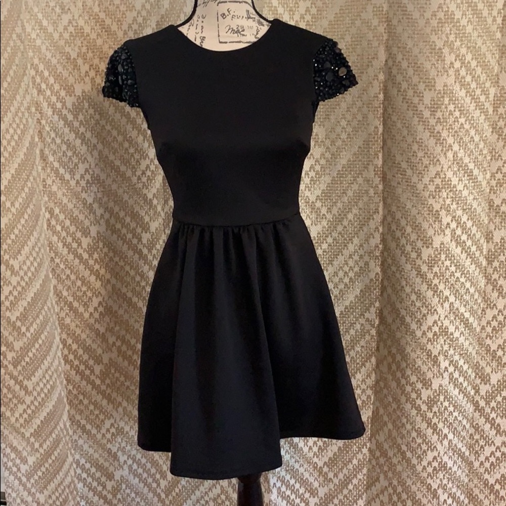 B. Darlin black dress w/ cap beaded sleeves